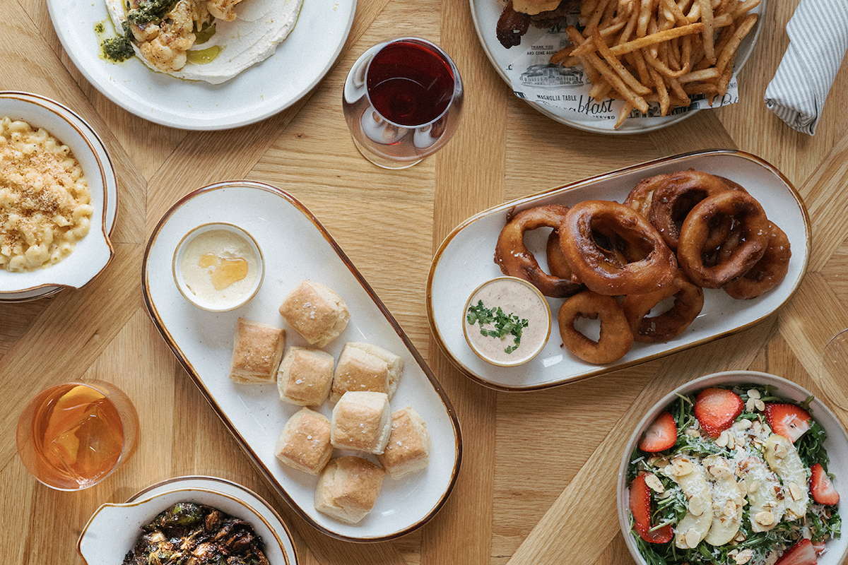 Dinner spread at Magnolia Table. | Photo by Magnolia Table