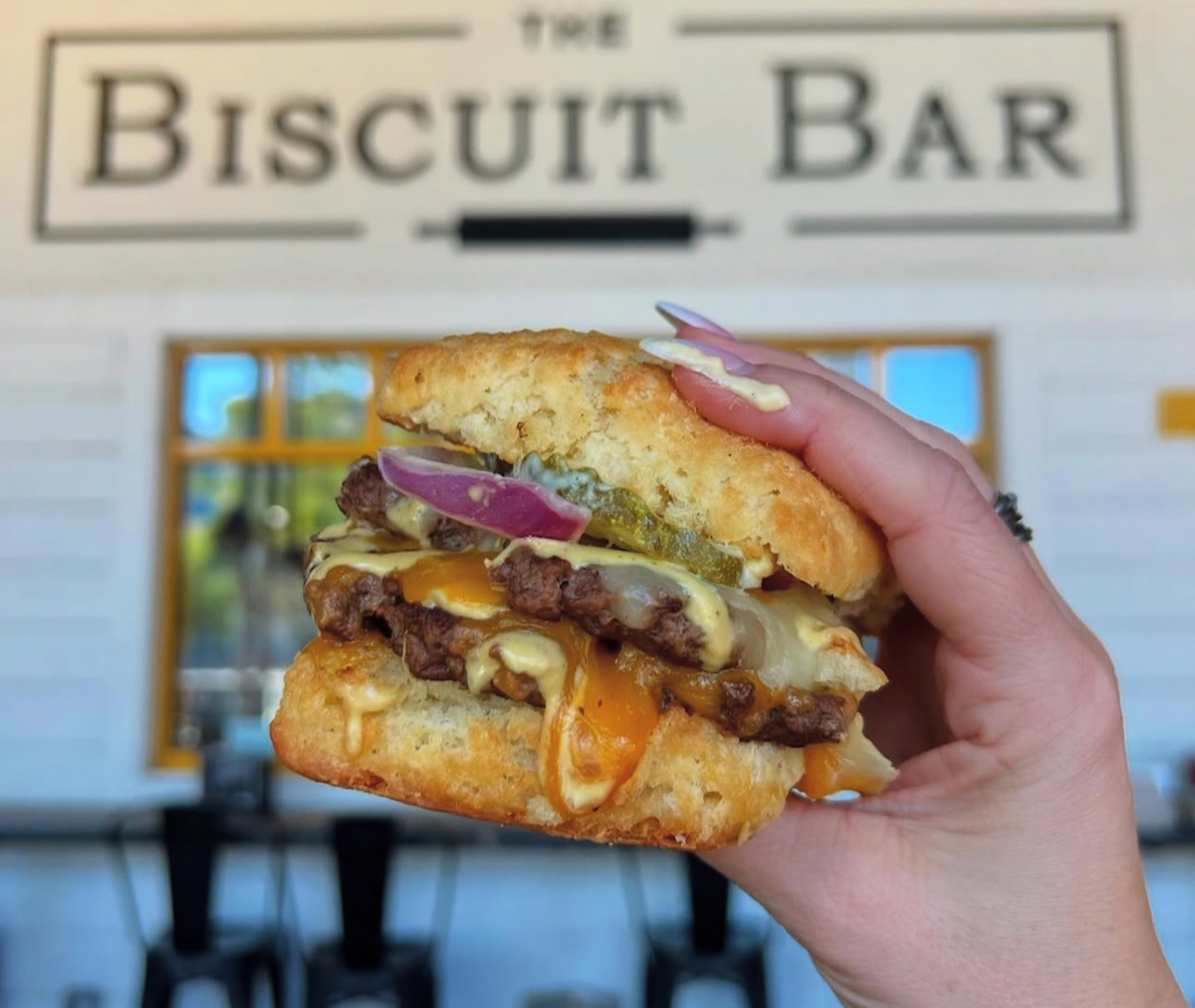 IMG_4773 - DiningOut Dallas A loaded breakfast biscuit at the Biscuit Bar. | Photo by the Biscuit Bar