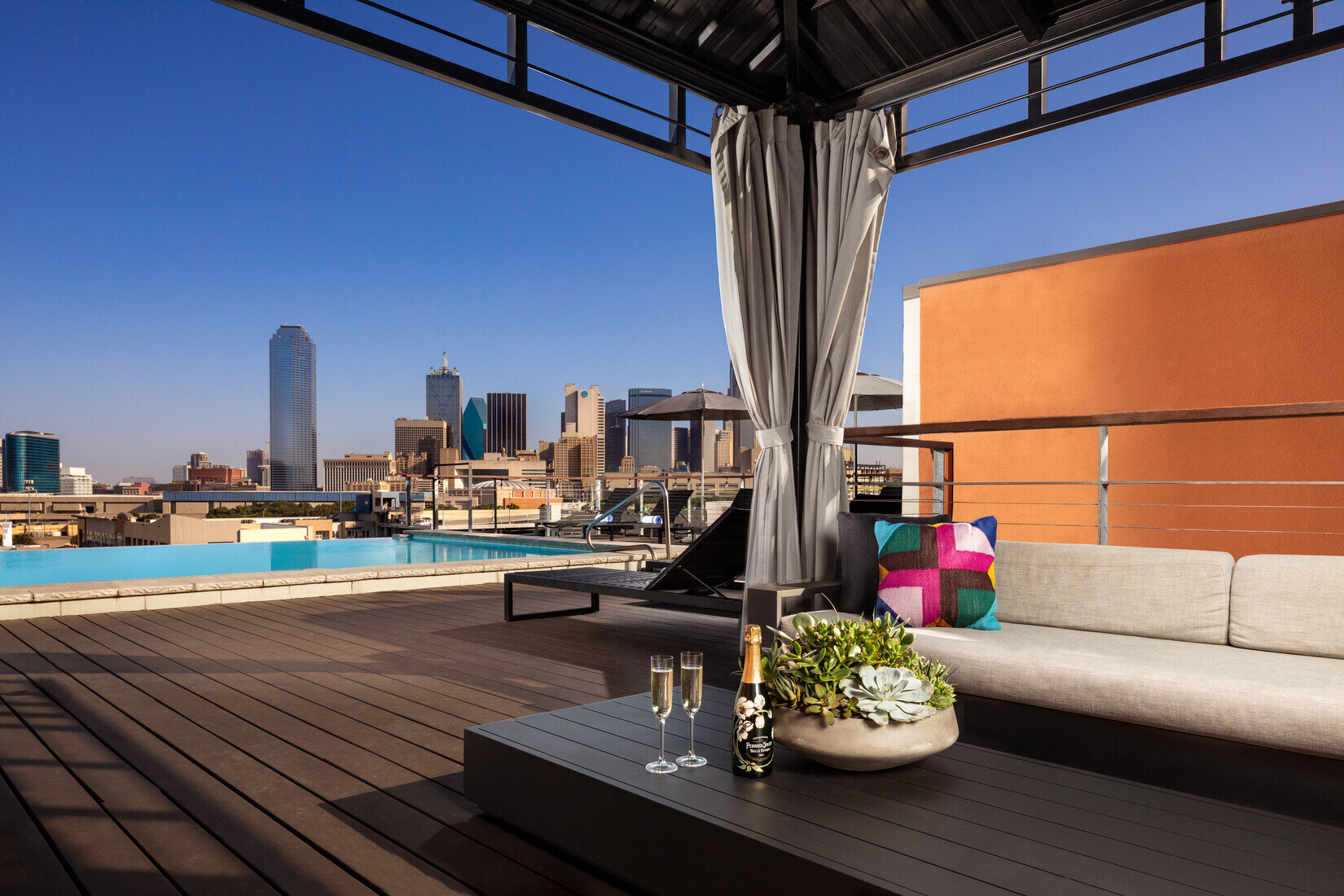 Poolside seating at the Gallery Rooftop Lounge. | Photo by Canvas Hotel