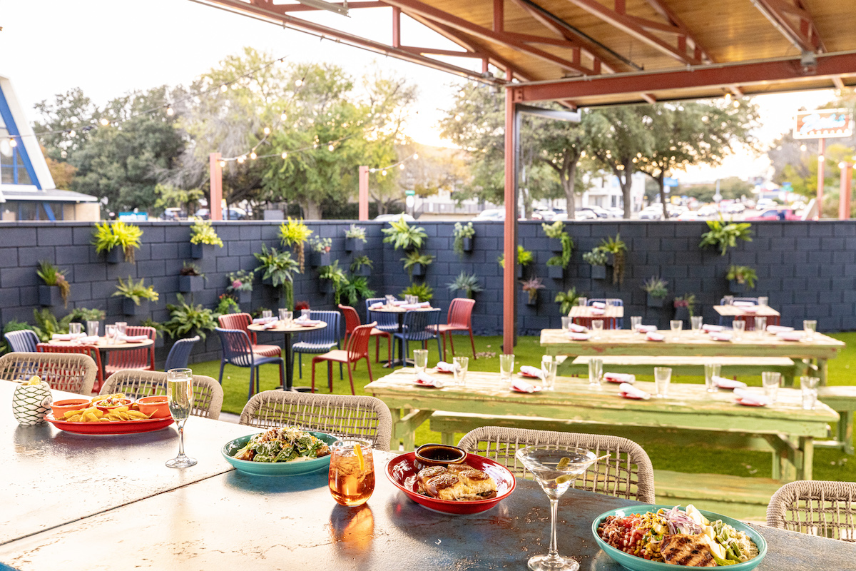 The patio at Birdie's Eastside is shaded with live oaks. | Photo by Kathy Tran