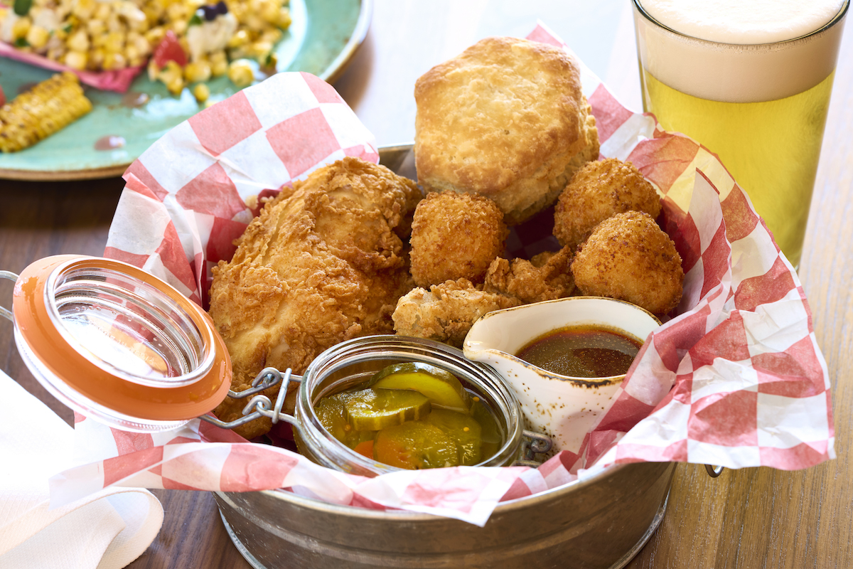 Chef Stephan Pyles' famed honey fried chicken at the Seeker. | Photo by Kevin Marple