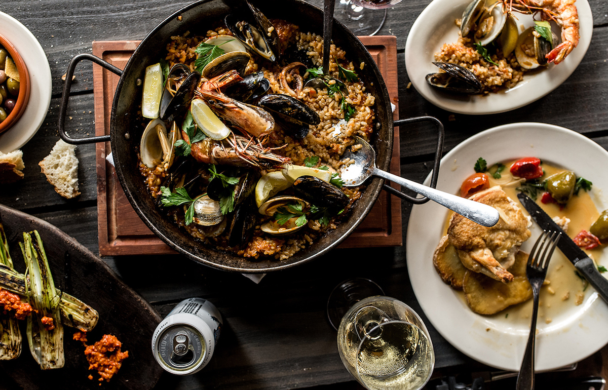 BestTapas_BarcelonaWineBAR_CourtesyofBarcelonaWineBar - DiningOut Dallas Paella with a spread of tapas at Barcelona Wine Bar. | Photo by Barcelona Wine Bar