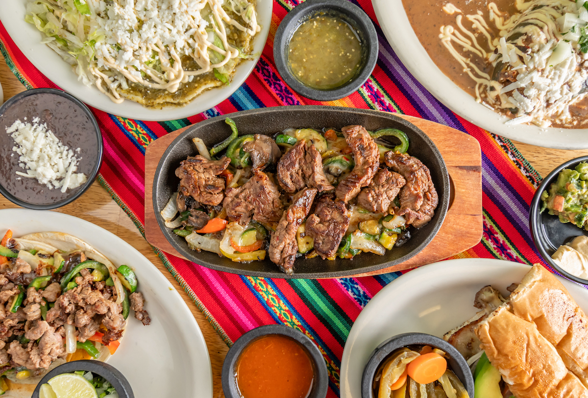 Domingo_Hero - DiningOut Dallas A spread of tacos, fajitas, and enchiladas at Domingo. | Photo by Domingo