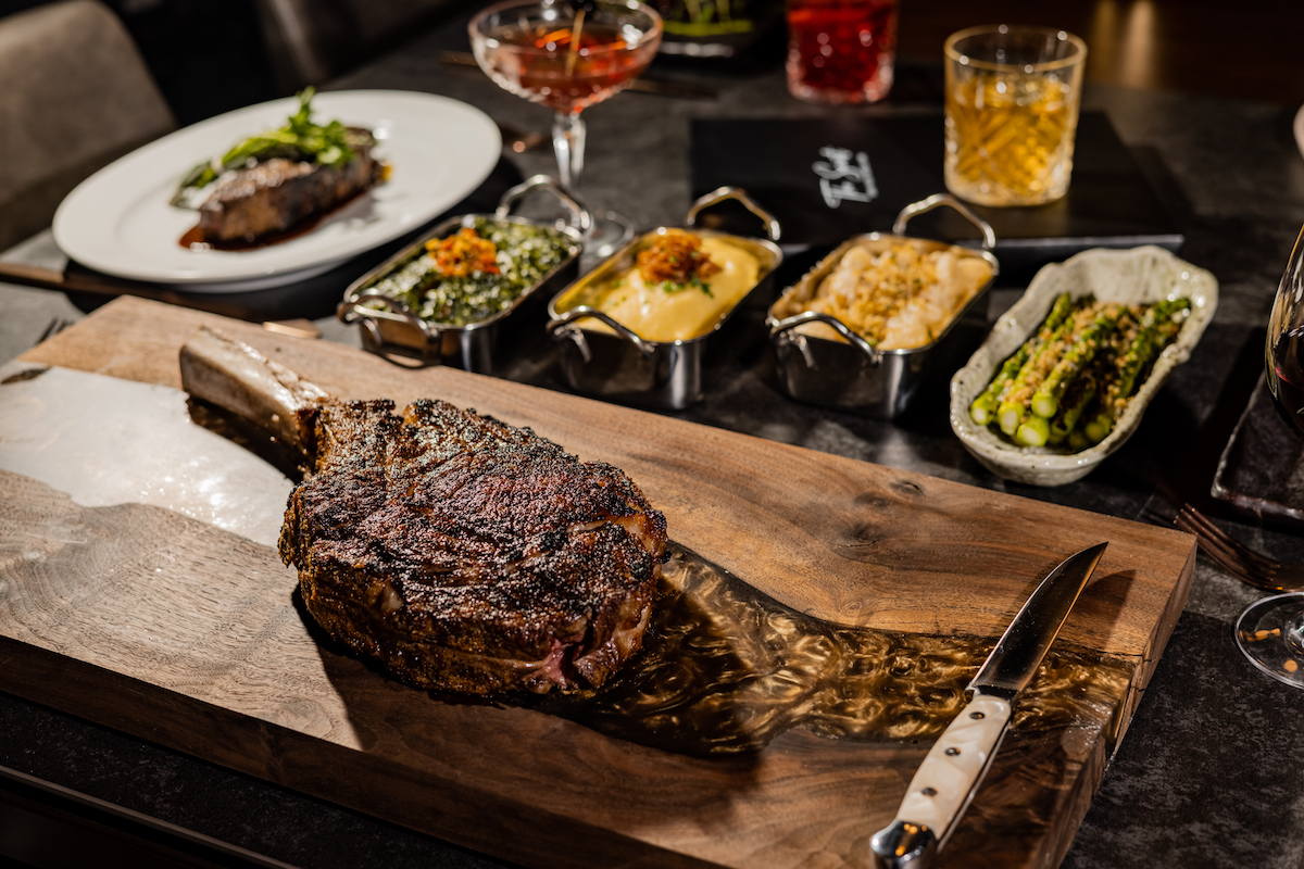 Press Release 11 of 38 - DiningOut Dallas A dramatic steak presentation at the Saint. | Photo by Kayla Enright