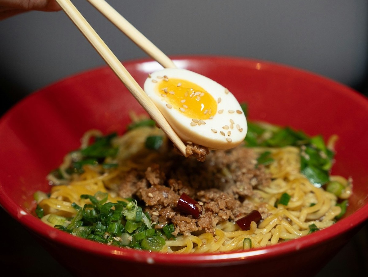 518460652_1277674287701653_298611419174826363_n - DiningOut Dallas A seasoned egg atop a bowl of ramen at Mr. Max. | Photo by Mr. Max