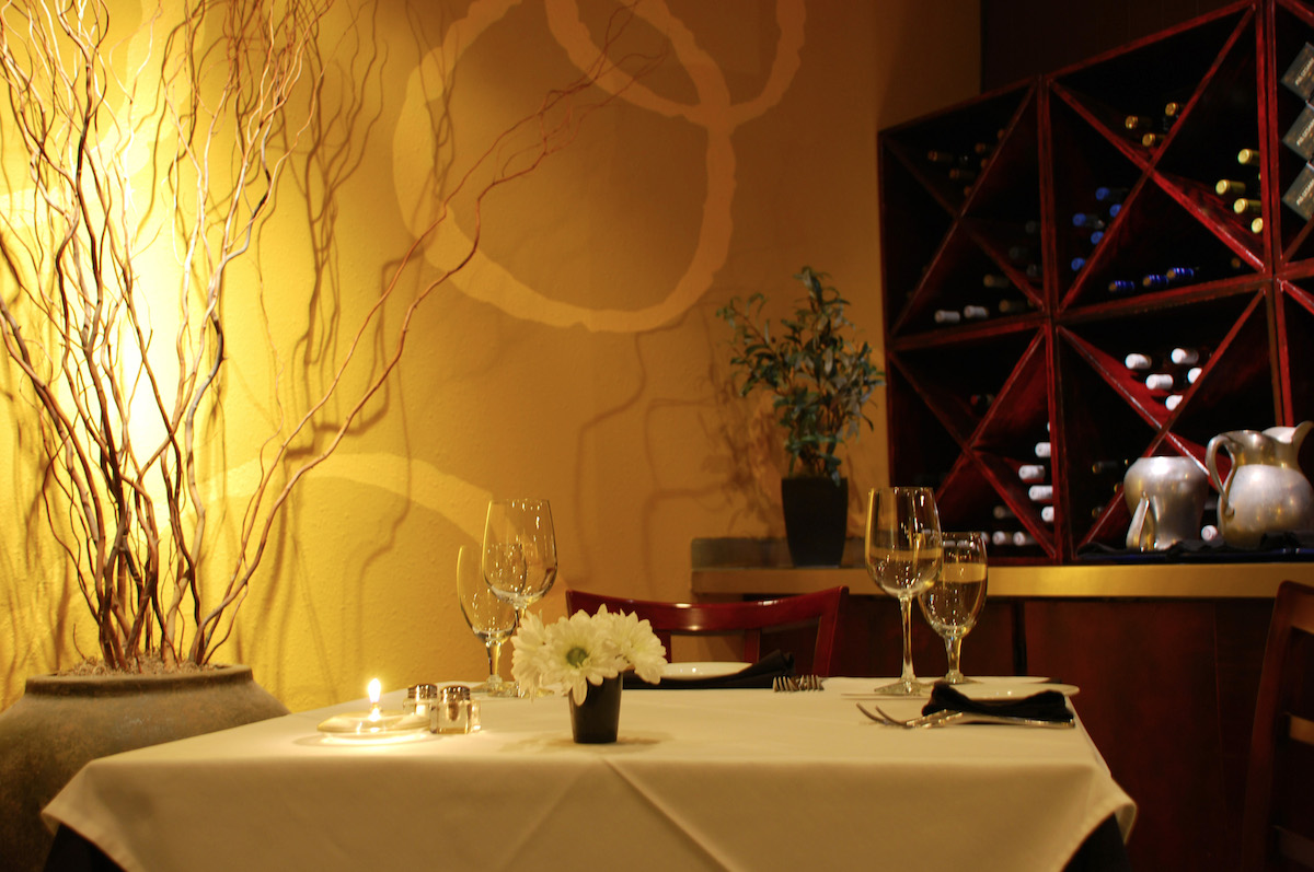 corner-table-0046-C - DiningOut Dallas A corner table in the dimly lit dining room at Gorji. | Photo by Gorji