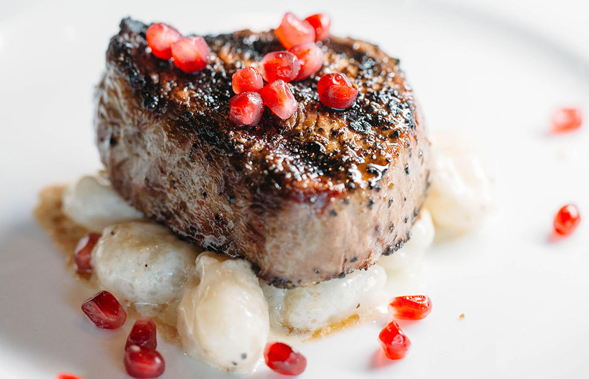 gorji-steak-pomegranates-300dpi-1200px - DiningOut Dallas Steak garnished with pomegranate seeds at Gorji. | Photo by Gorji