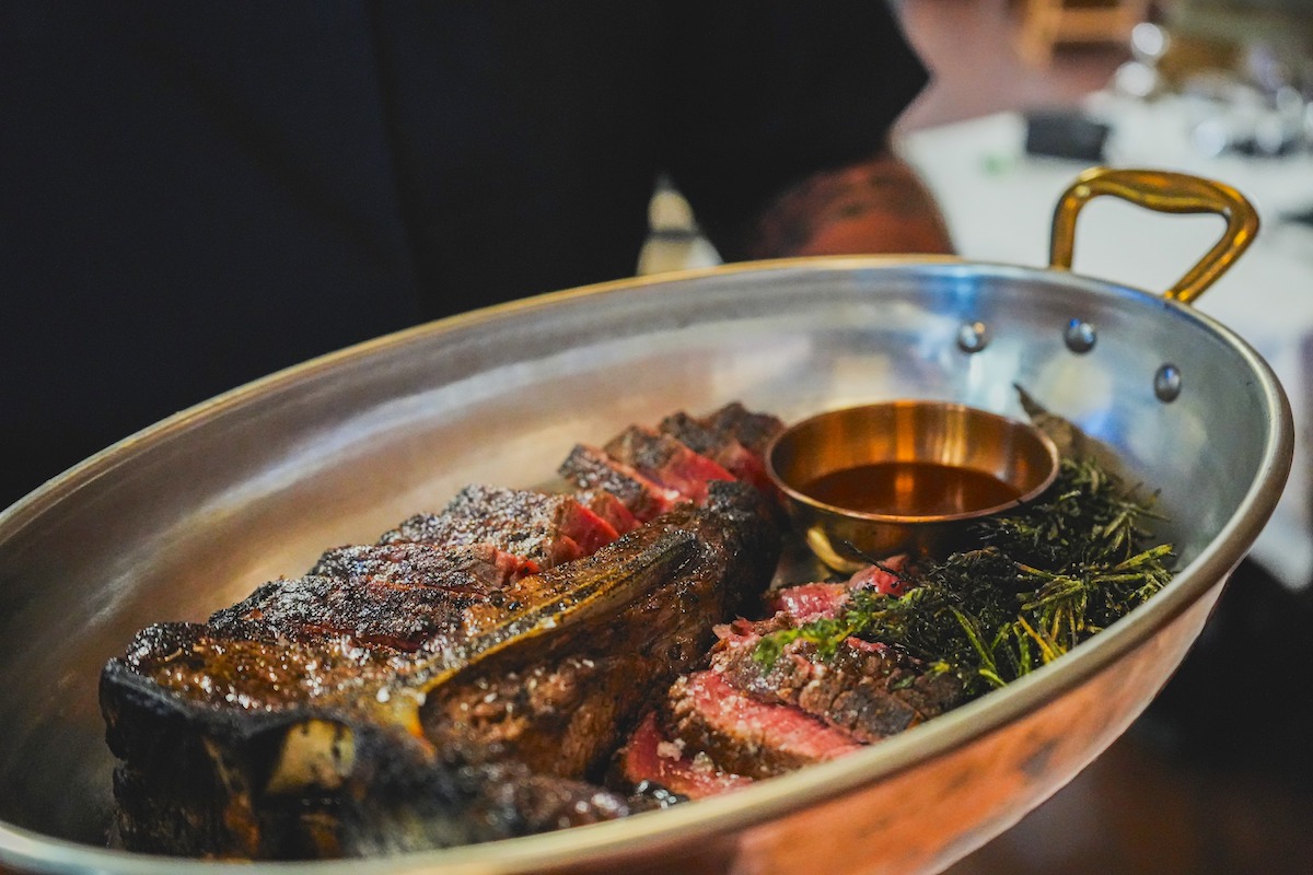 Bar Ranch - DiningOut Dallas The 32-ounce Prime Black Angus Bistecca at BAR-Ranch Steak Company showcases a filet and NY strip side by side. | Photo by BAR-Ranch Steak Company